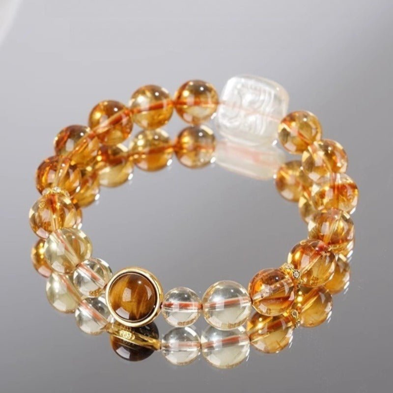 Wealth Guardian Zhamo Lama Charm Bracelet - Protection & Good Fortune - Staged shot of Citrine bracelet