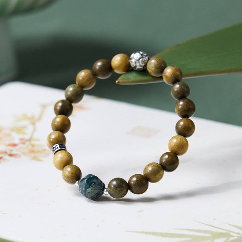Wealth Wave Sandalwood Bracelet - Prosperity • Focus • Harmony - prop-styled shot