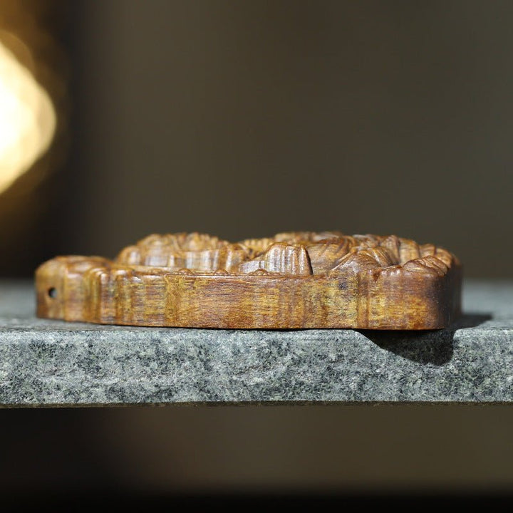 Wealth &amp; Well - Being Yellow Jambhala Pendant - Protection &amp; Sacred Grounding - side view of agarwood pendant