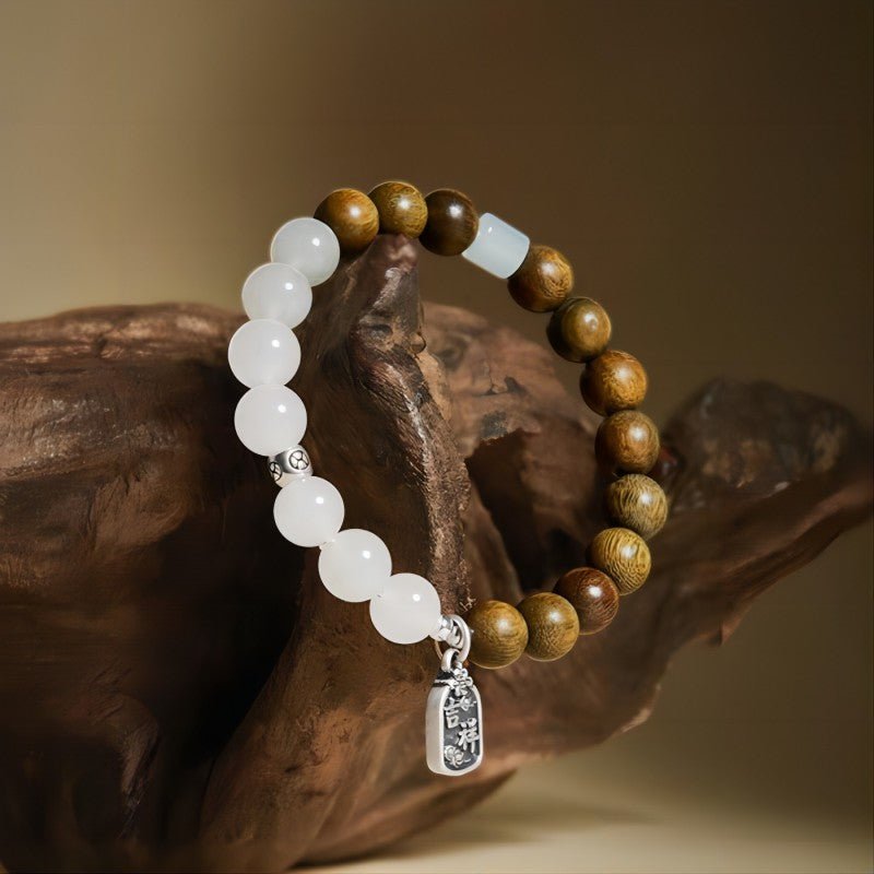 Wisdom & Harmony Sandalwood And Jade Bracelet With Ruyi Charm - Clarity • Spirituality • Peace - prop-styled shot
