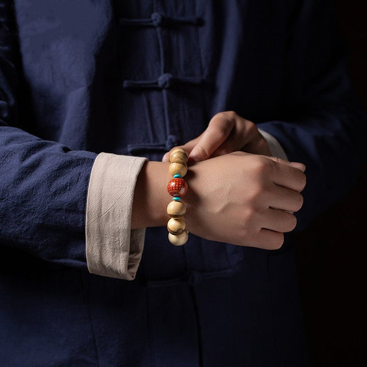 Wisdom &amp; Protection Heart Sutra Mantra Sandalwood Bracelet - on wrist