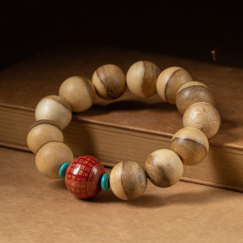Wisdom & Protection Heart Sutra Mantra Sandalwood Bracelet - staged shot